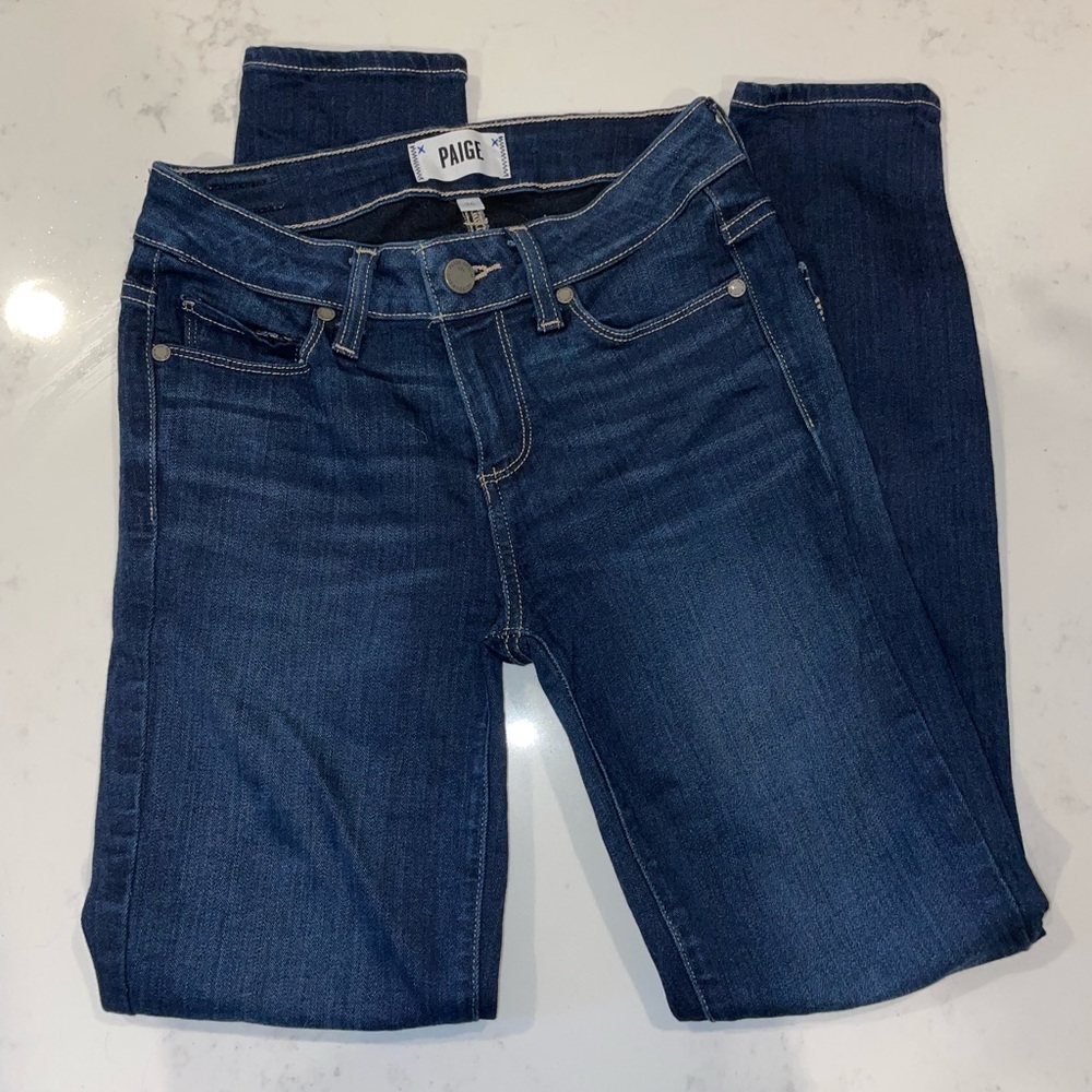 Like new Paige denim skinny jeans. Mid rise, dark wash jeans!
